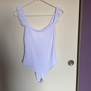 White body shit with ruffled straps